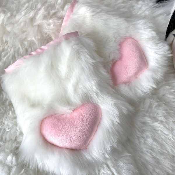 Furry handmade love pads close to the claws